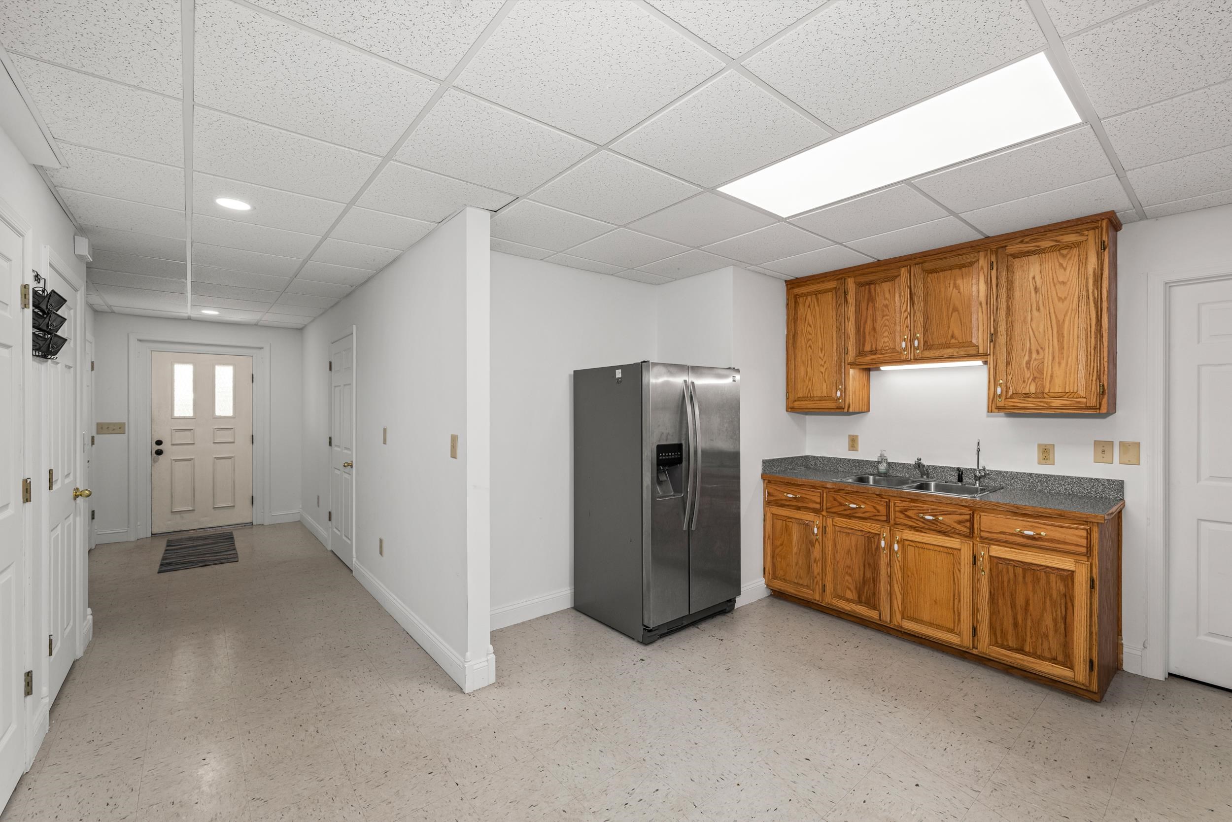 with a separate entrance and view of the kitchen