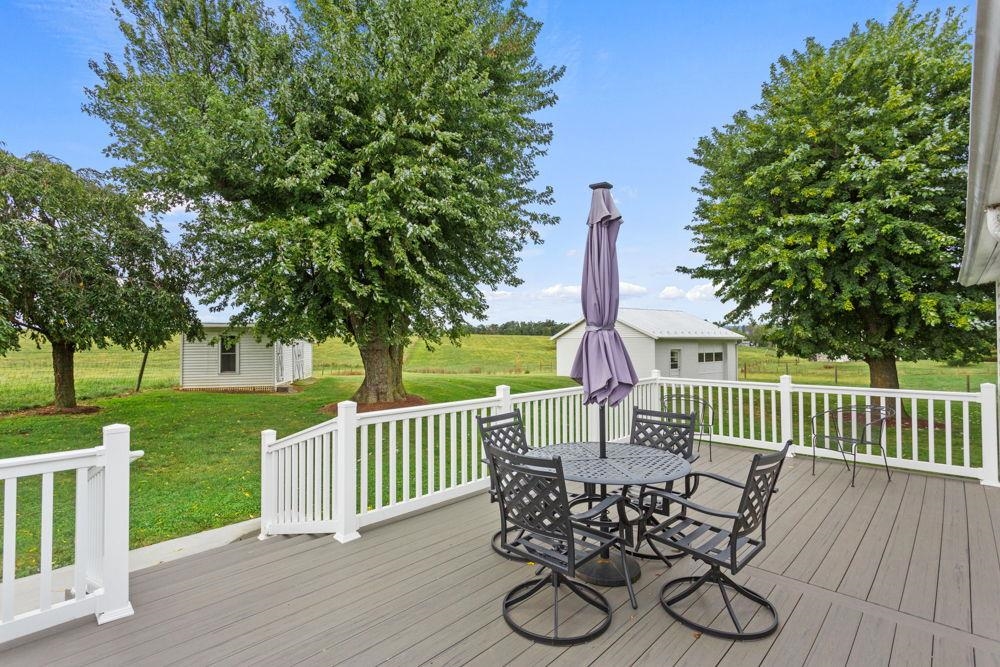 nice size composite deck with vinyl railing.