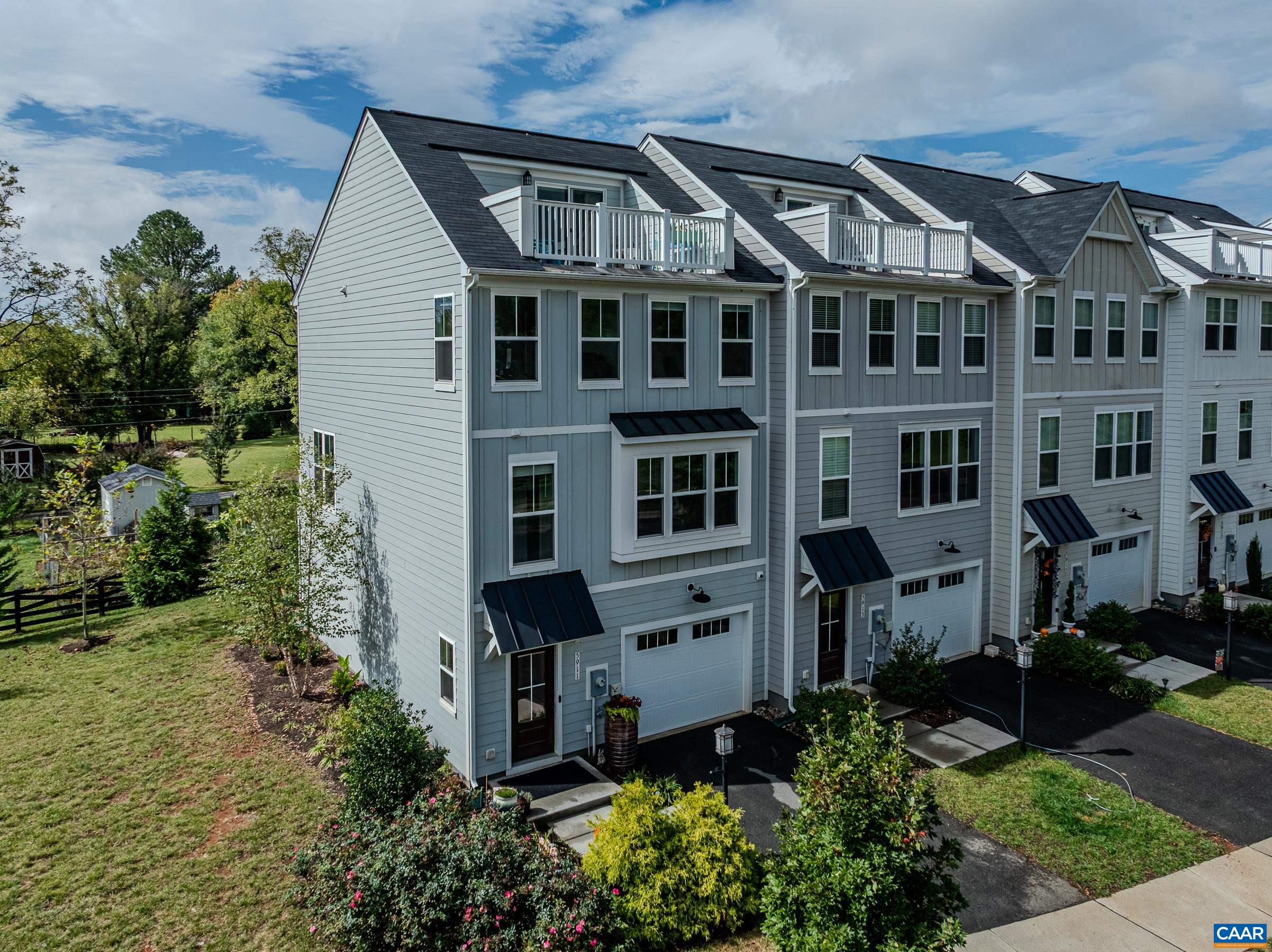 End unit former model townhome in Pleasant Greene is a must-see!