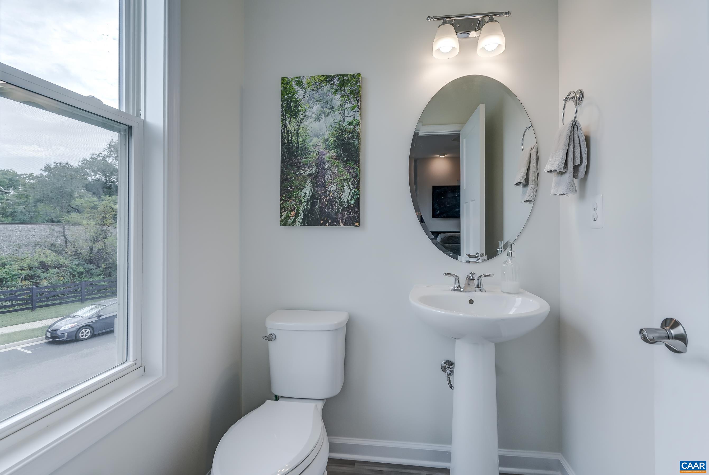 Powder room with pedestal sink.