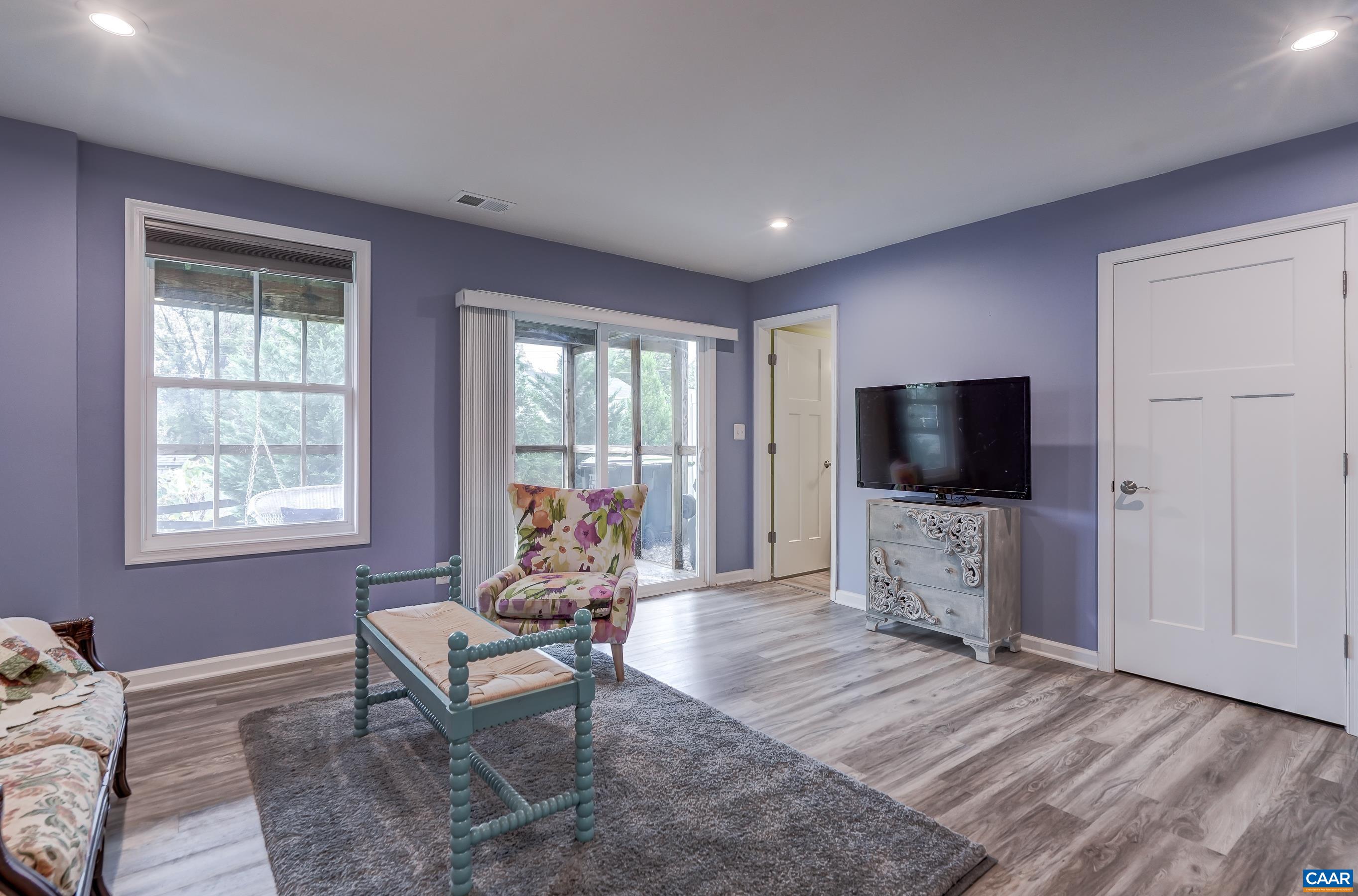 Sliding door leads to screened porch!
