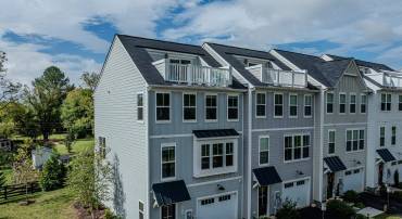 End unit former model townhome in Pleasant Greene is a must-see!