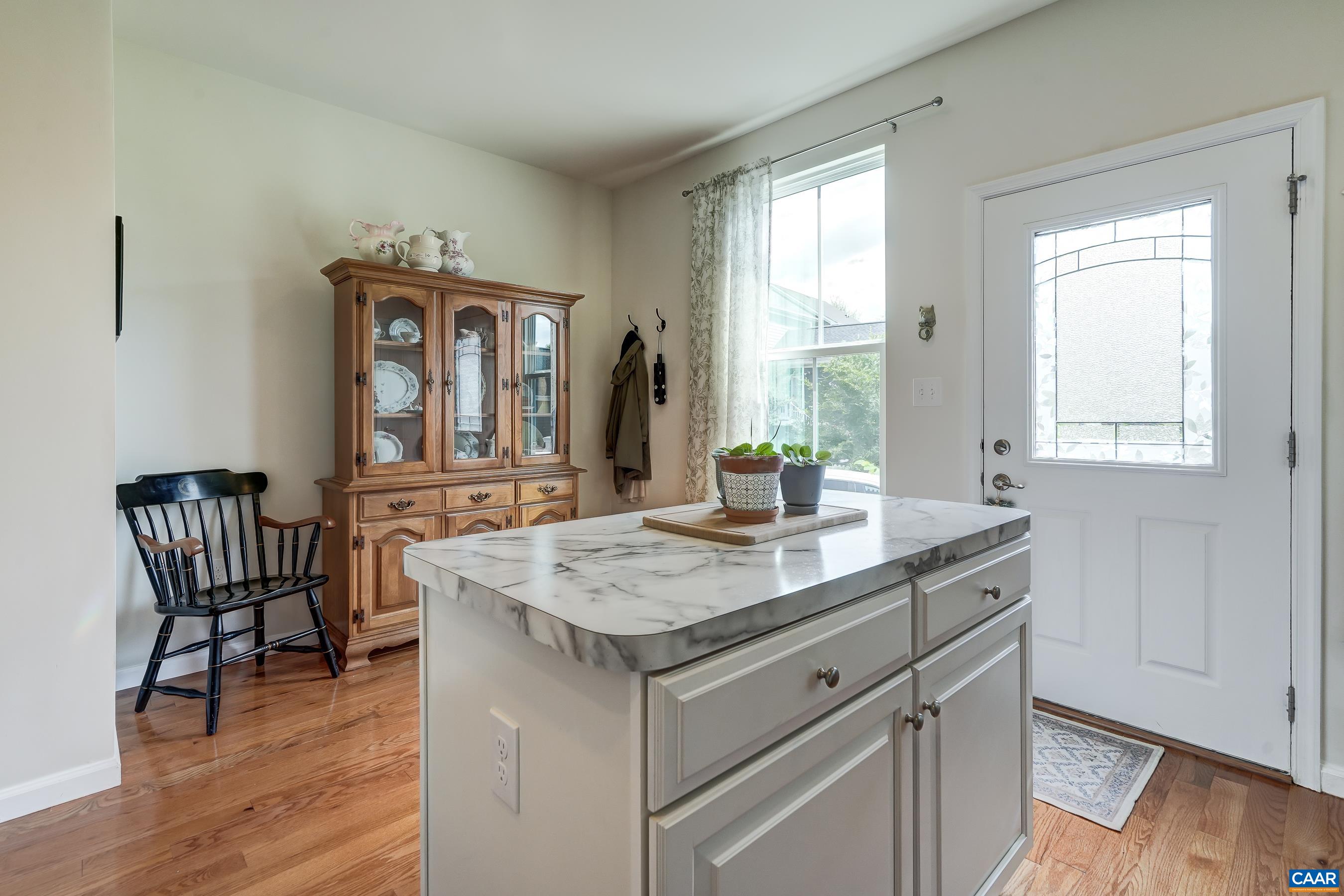 Rear door leads to back deck and parking.