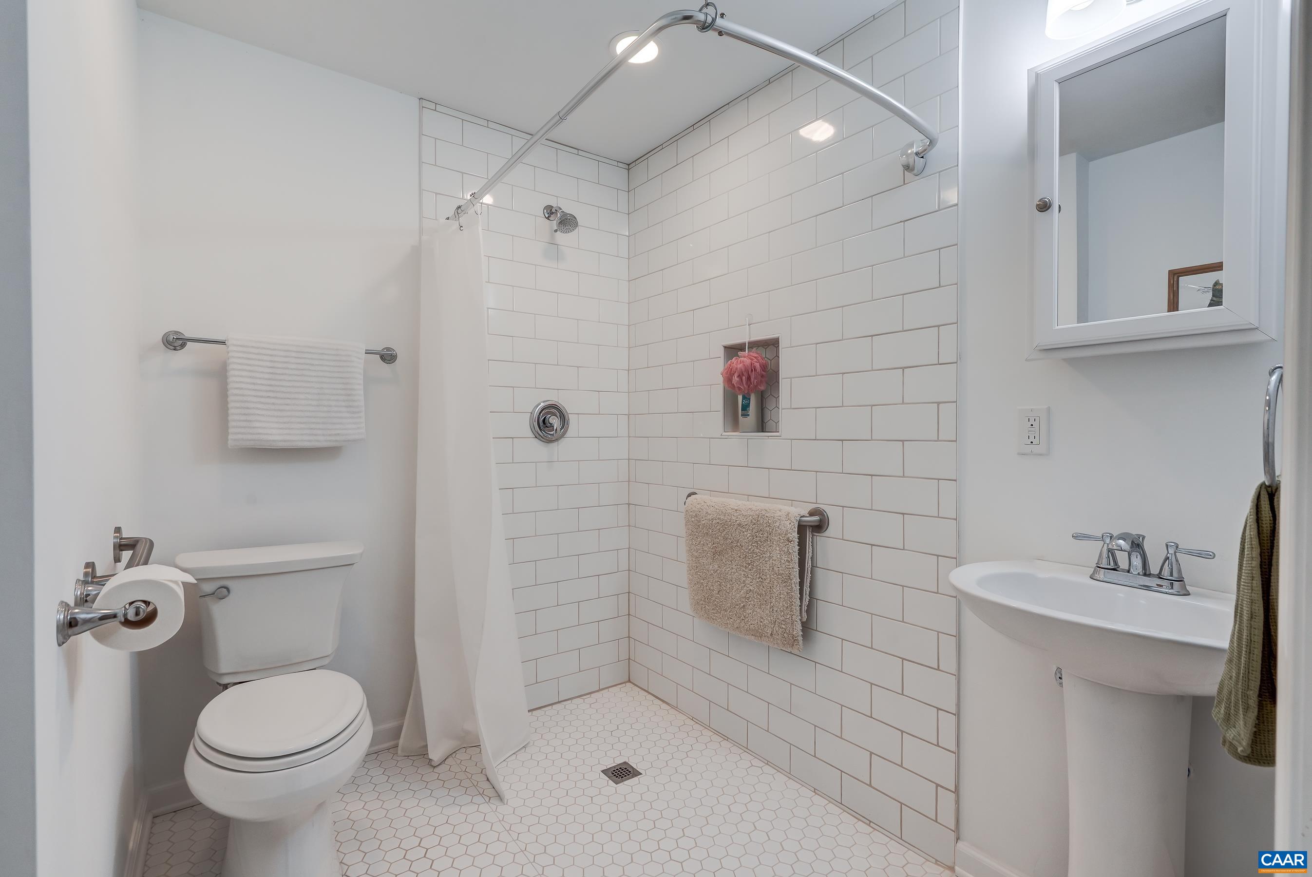 Full bathroom with zero-step shower.