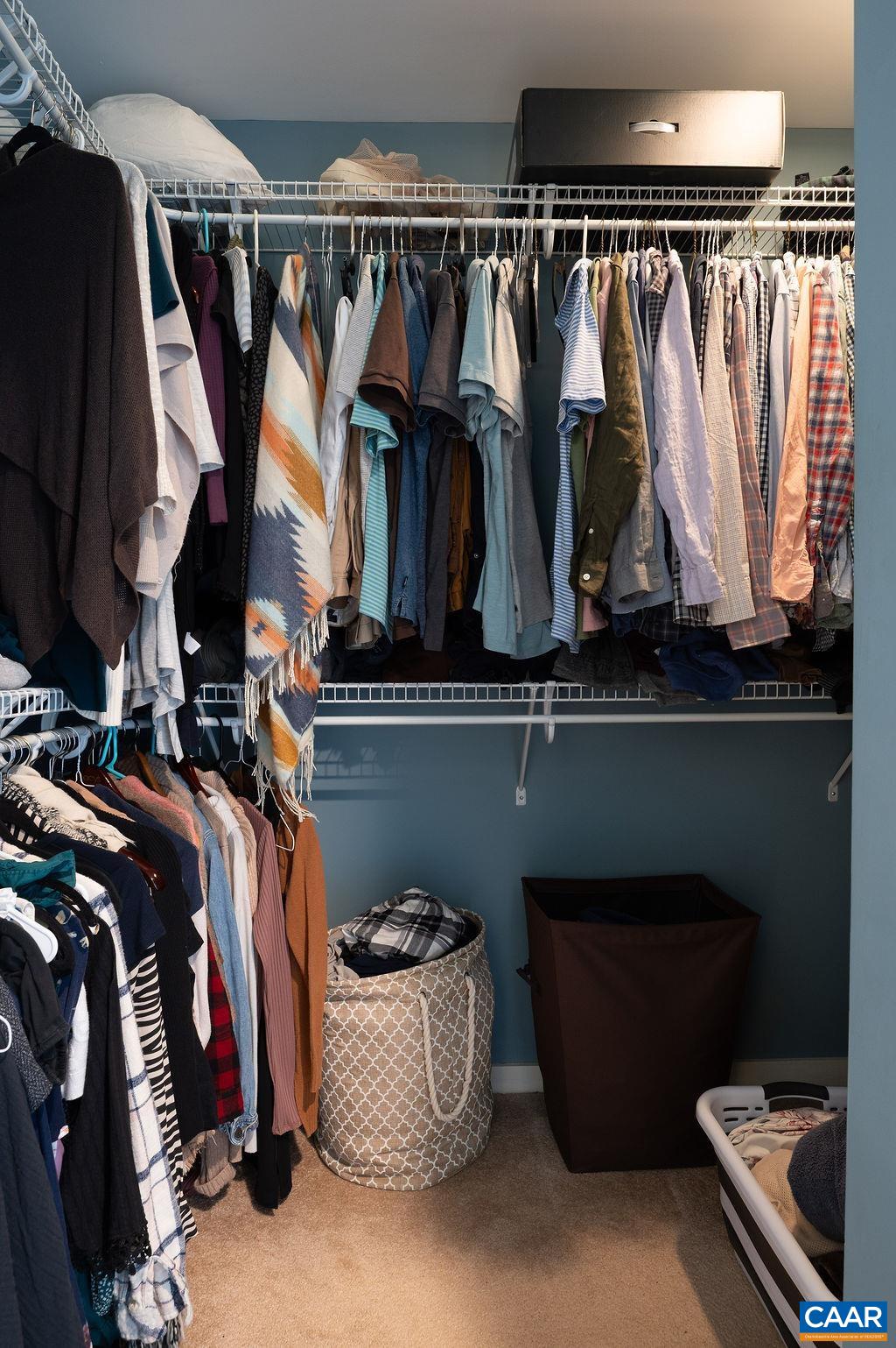 Walk-in closet in primary bedroom