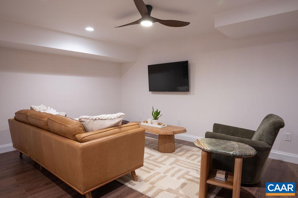 Basement family room, installed TV conveys