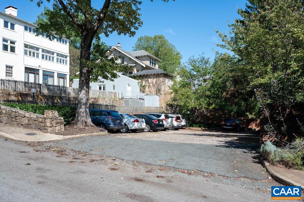 Entrance to lighted parking area for the development