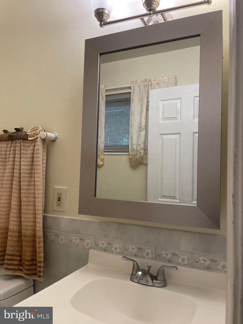 1006 S GREENTHORN AVE, STERLING, Virginia 20164, 3 Bedrooms Bedrooms, 5 Rooms Rooms,2 BathroomsBathrooms,Residential,For sale,1006 S GREENTHORN AVE,VALO2108304 MLS # VALO2108304
