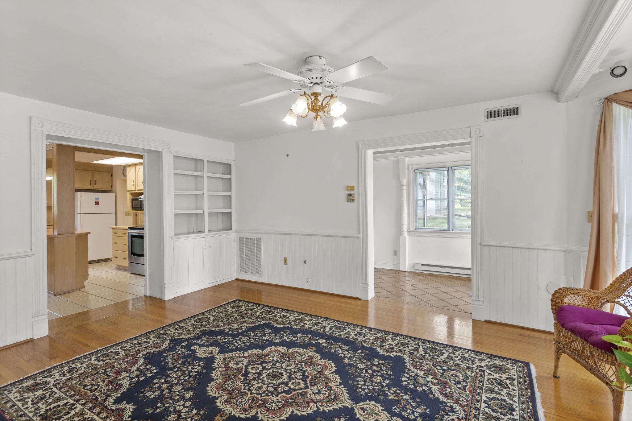 with built in cabinets & speakers throughout the home.