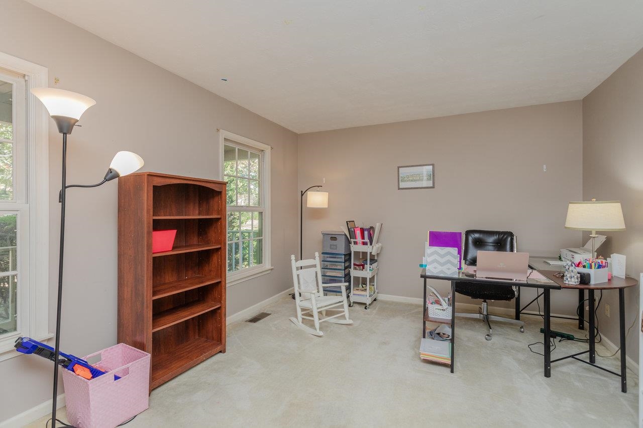 This room could serve as a home office or playroom.