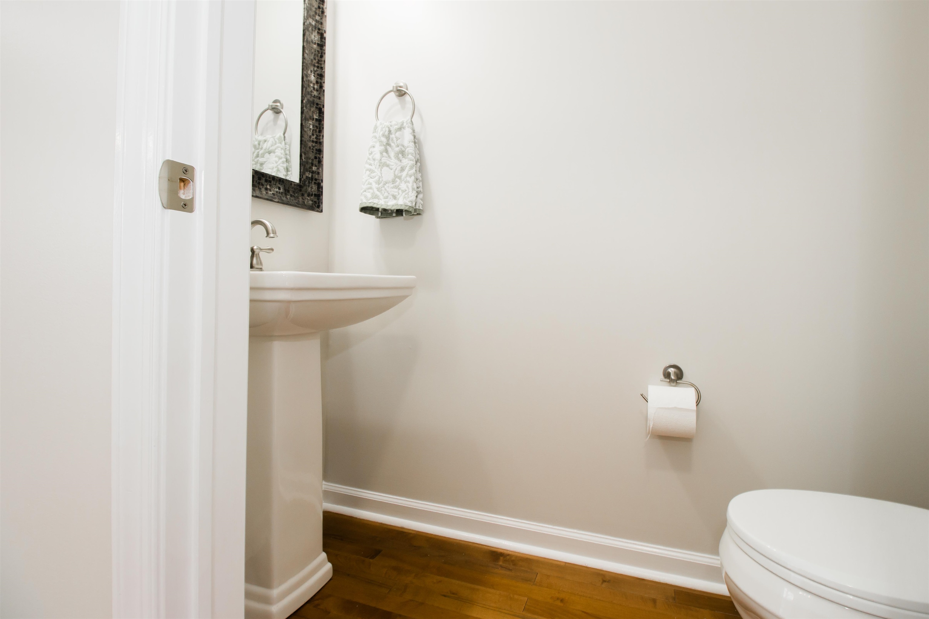 *Pedestal sink *hardwood floors *Pedestal sink *hardwood floors