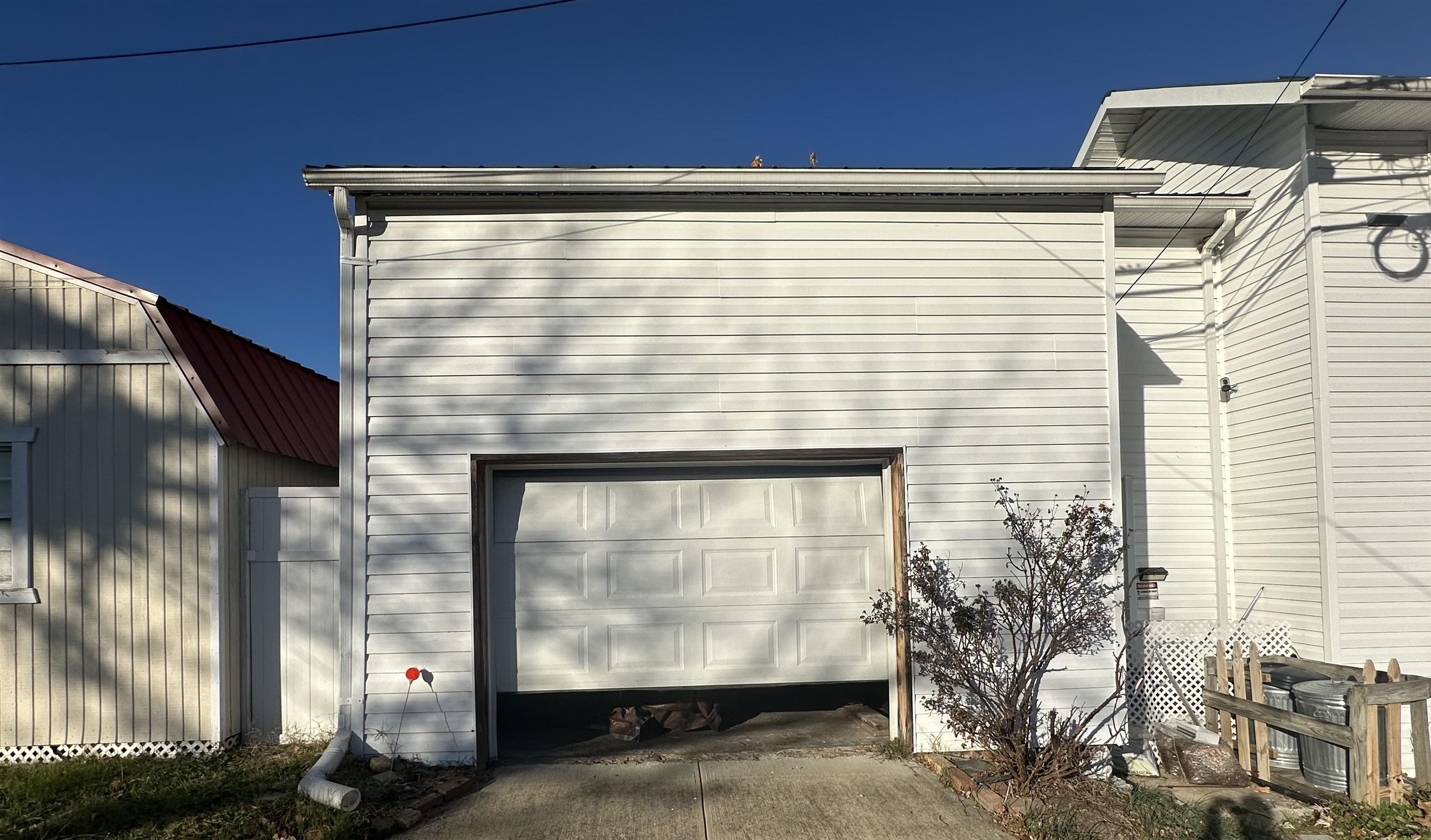 with loft storage and automatic garage door openers.
