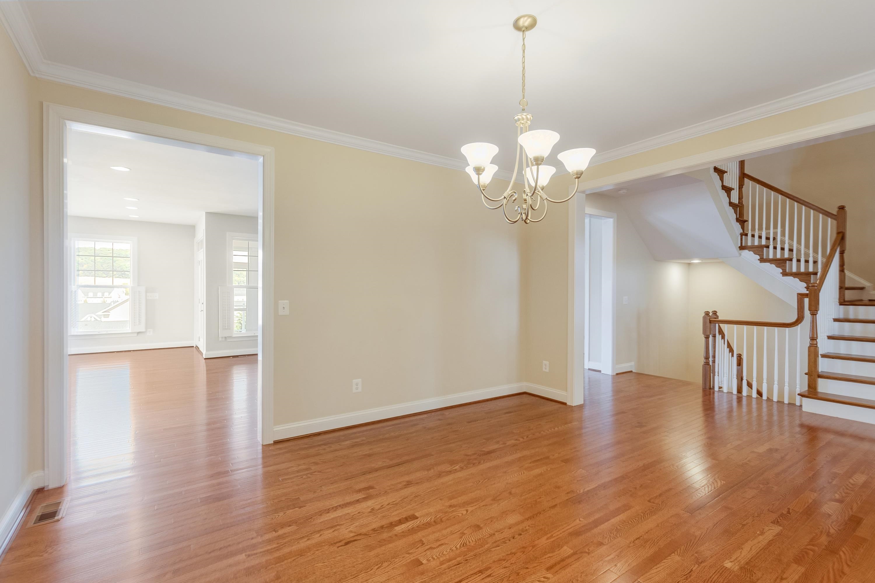 The dining area offers hardwood flooring throughout, large windows allowing in lots of natural light throughout the space, and plenty of space for a table and chairs set.