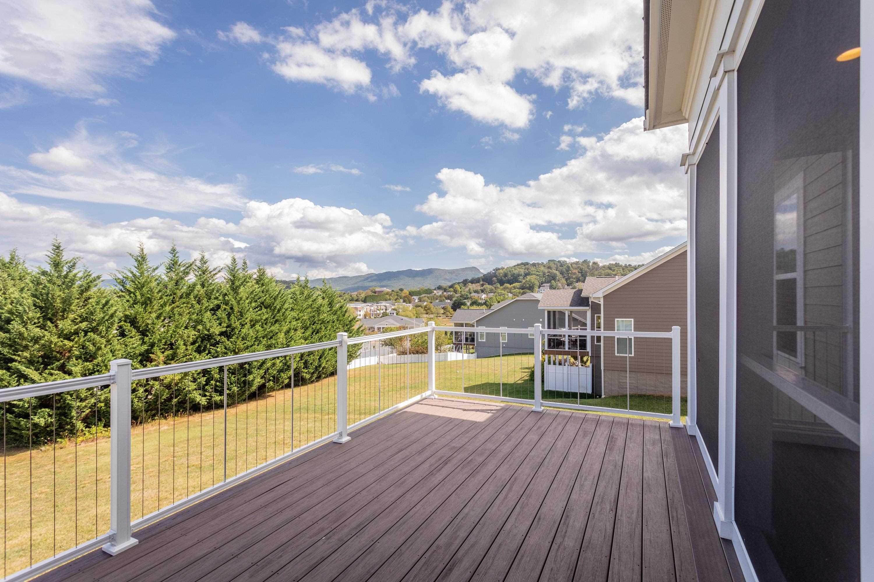 The deck features composite decking materials and beautiful views!