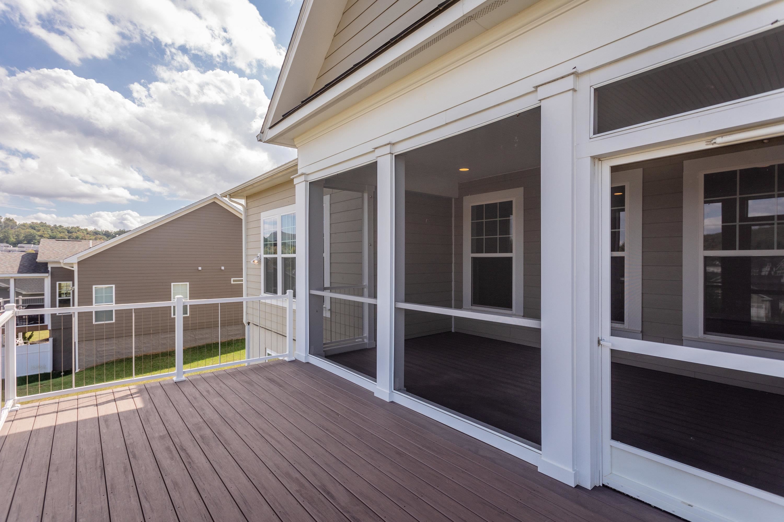 The deck features composite decking materials and beautiful views!