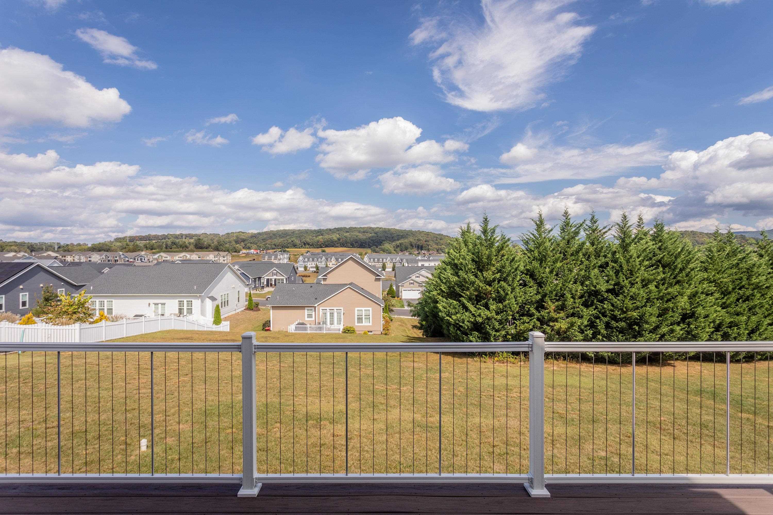 The deck features composite decking materials and beautiful views!