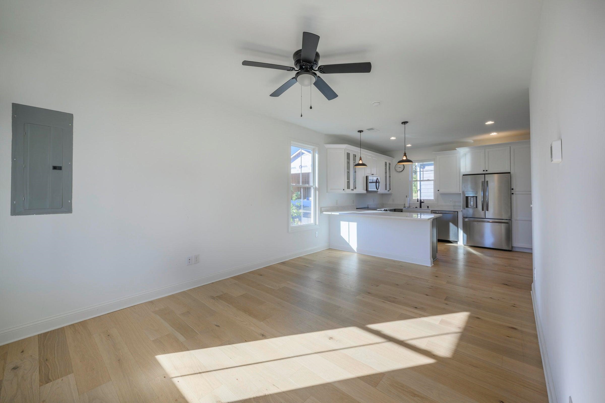 Another view of the Great Room, which extends into the kitchen. Another view of the Great Room, which extends into the kitchen.