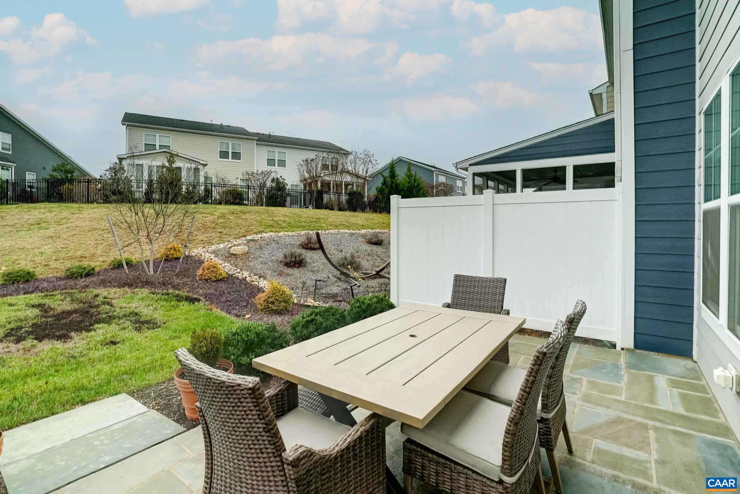 Bluestone with privacy plantings around patio. Bluestone with privacy plantings around patio.