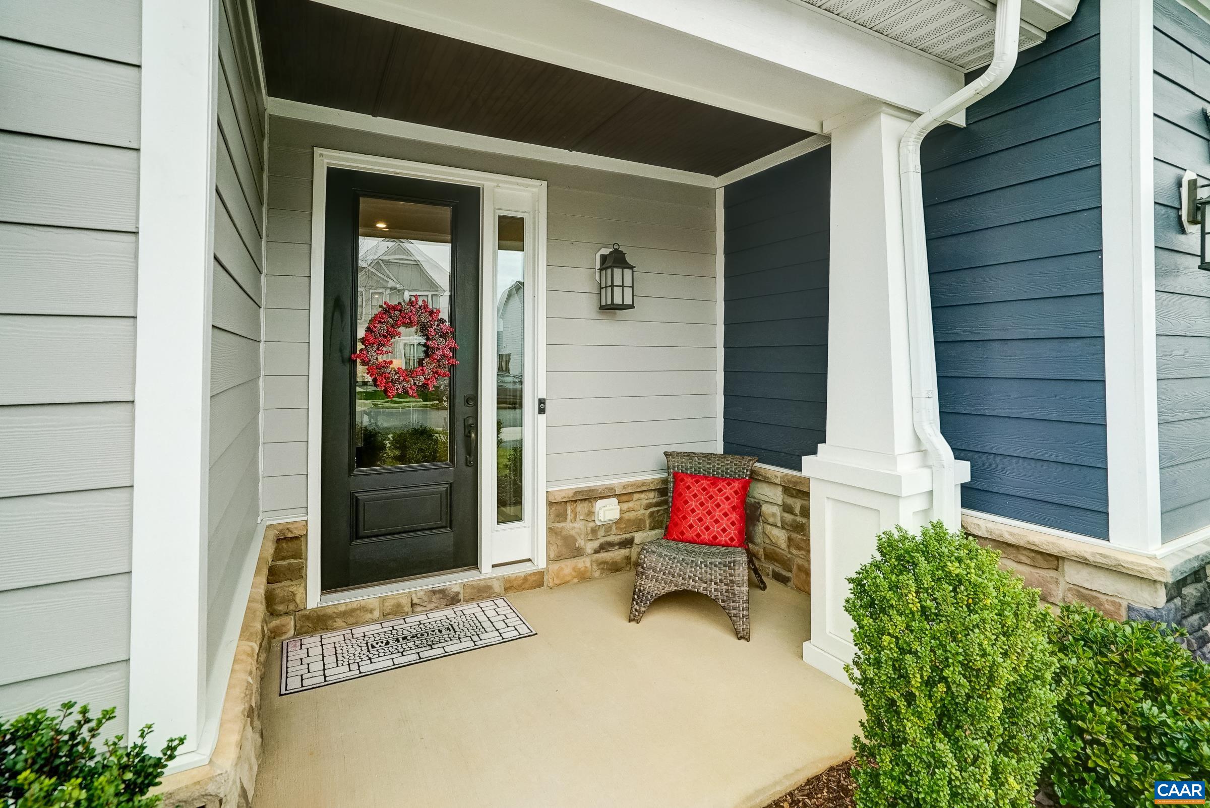 Charming front porch welcomes guests to your home. Charming front porch welcomes guests to your home.