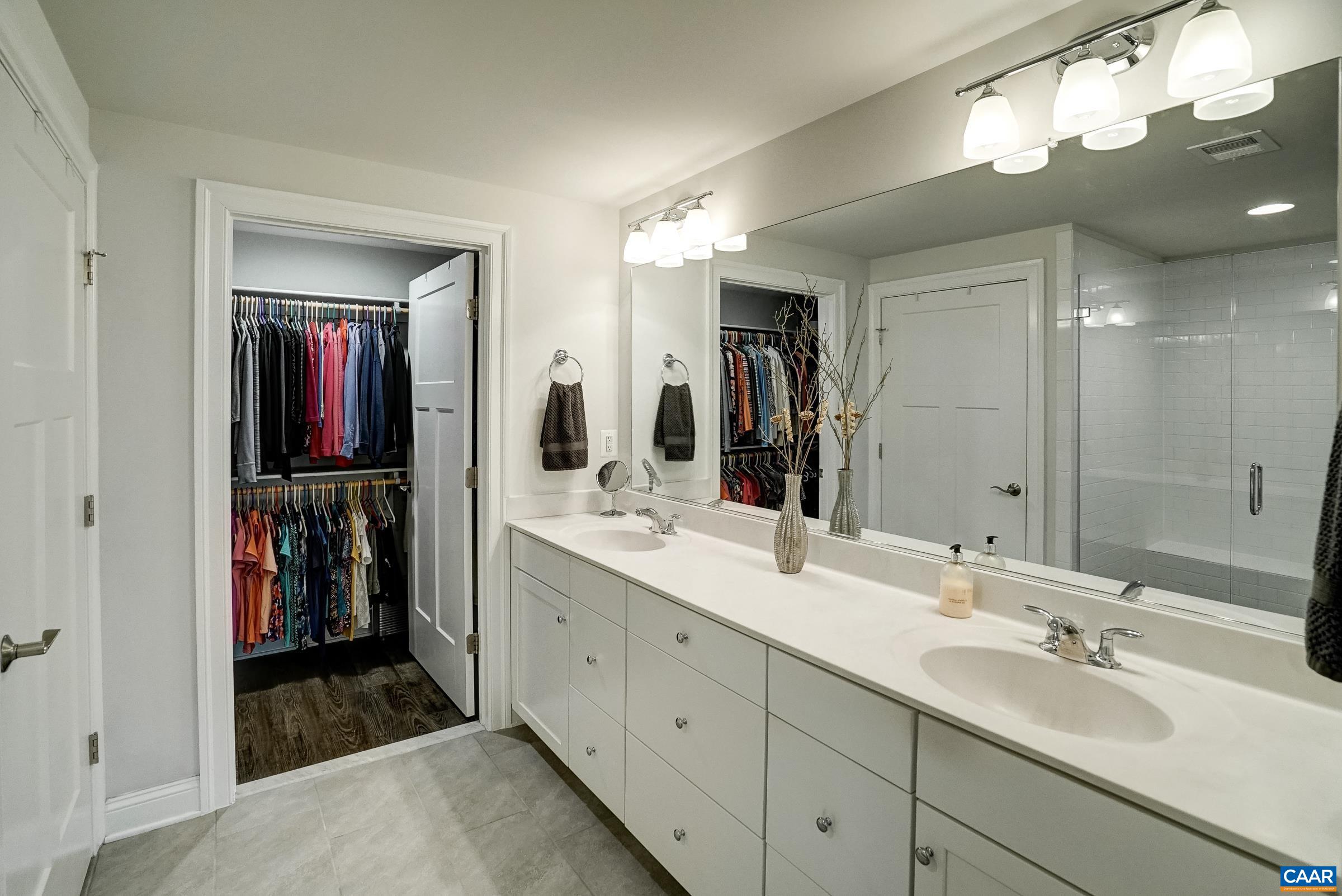 Primary bathroom with double sink large vanity. Primary bathroom with double sink large vanity.