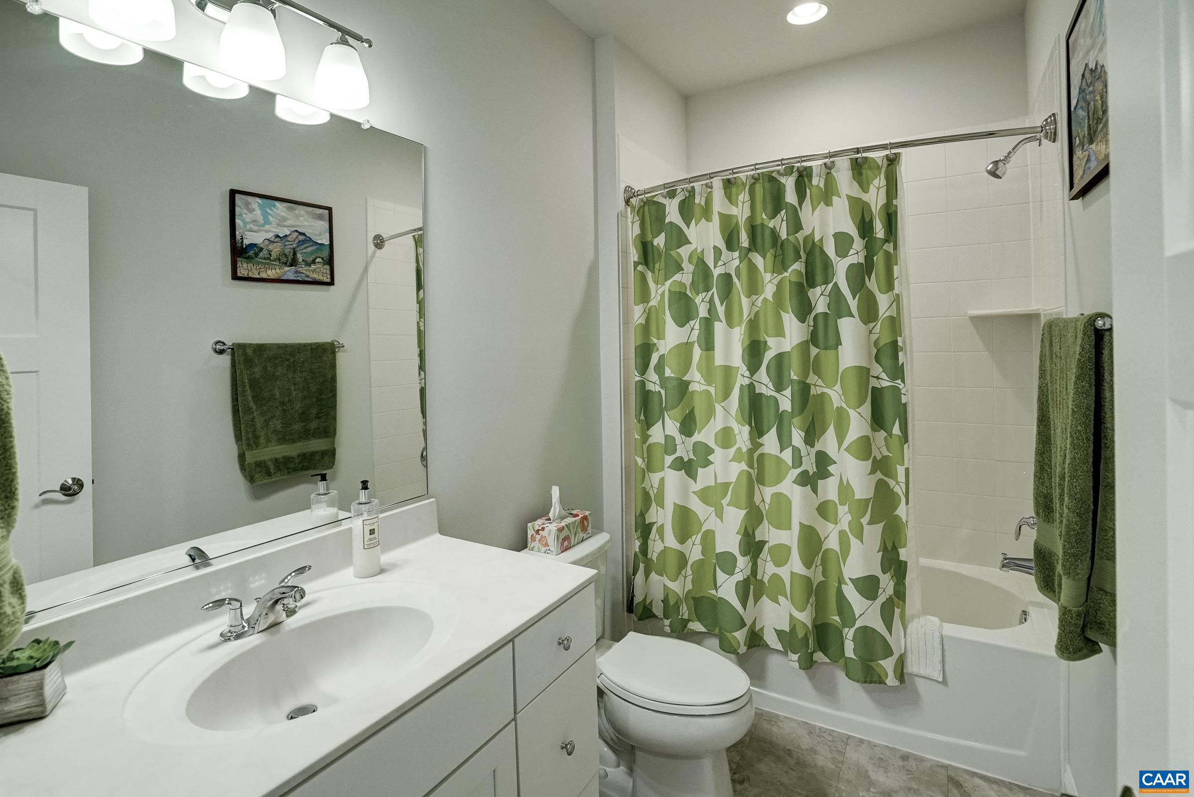 Full hall bathroom with tub/shower. Full hall bathroom with tub/shower.