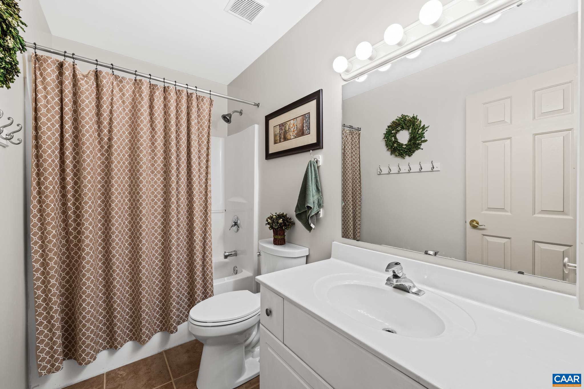 This full bath is clean and inviting. Featuring a bright white vanity with a large mirror, shower/tub combo. This full bath is clean and inviting. Featuring a bright white vanity with a large mirror, shower/tub combo.