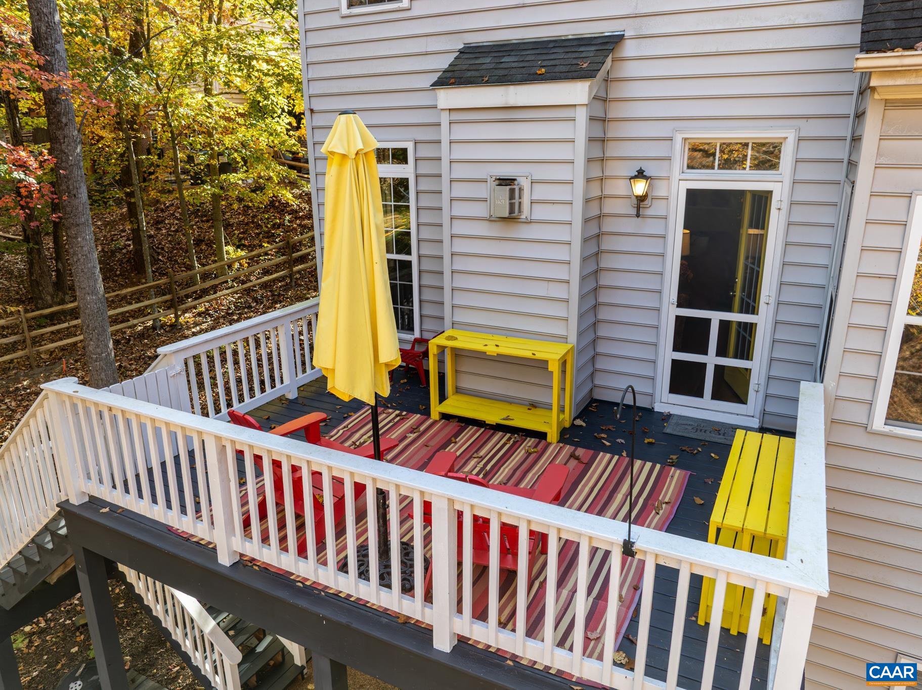 Enjoy the privacy of this spacious outdoor deck, perfect for entertaining or relaxing. Add your choice of vibrant colors for seating and and accents. This deck offers a cheerful spot to enjoy the wooded view and fresh air. Enjoy the privacy of this spacious outdoor deck, perfect for entertaining or relaxing. Add your choice of vibrant colors for seating and and accents. This deck offers a cheerful spot to enjoy the wooded view and fresh air.
