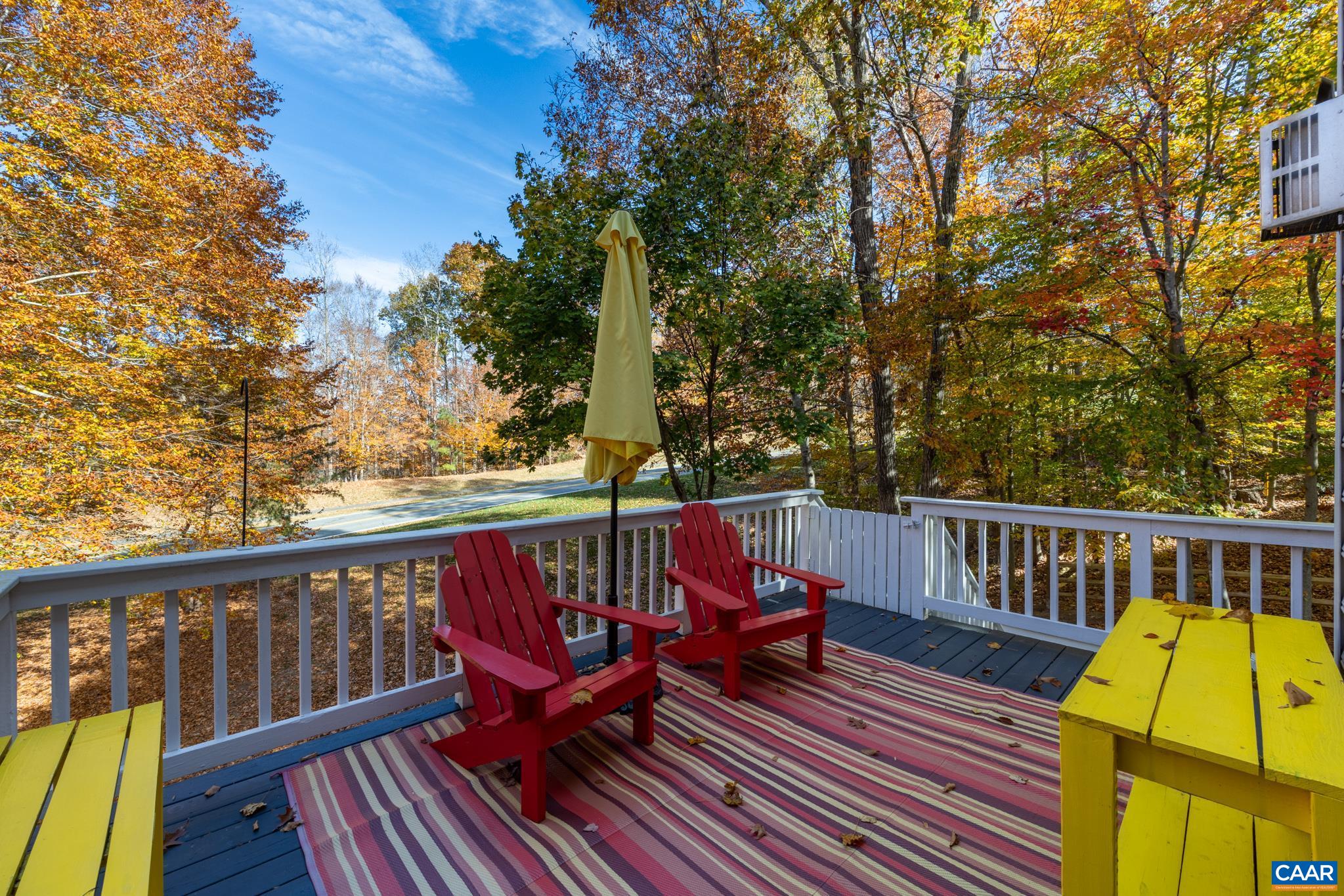 Enjoy the privacy of this spacious outdoor deck, perfect for entertaining or relaxing. This deck offers a cheerful spot to enjoy the wooded view and fresh air. Enjoy the privacy of this spacious outdoor deck, perfect for entertaining or relaxing. This deck offers a cheerful spot to enjoy the wooded view and fresh air.