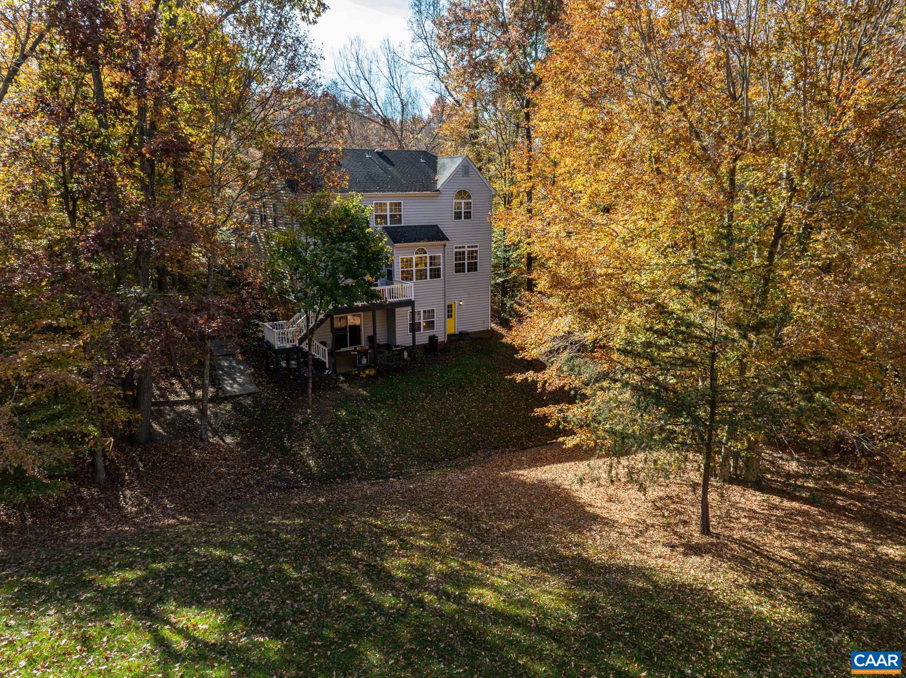 Expansive back yard which enjoys the benefit of being adjacent to the common area along Ashland Blvd. Expansive back yard which enjoys the benefit of being adjacent to the common area along Ashland Blvd.