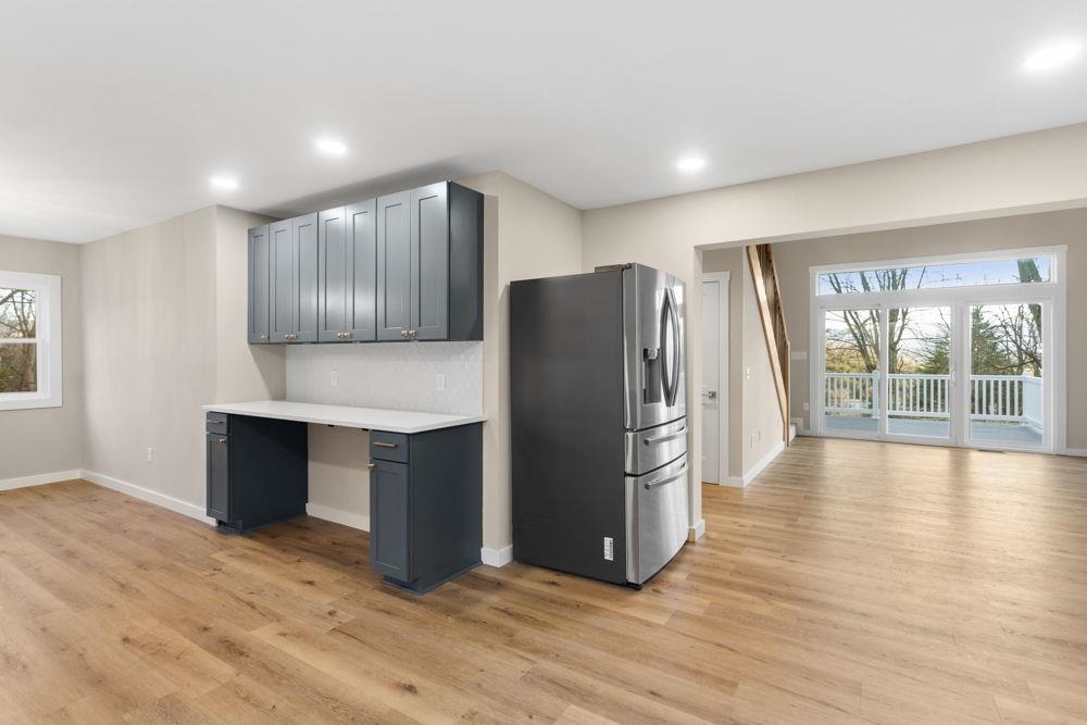 Breakfast bar with opening to living room and to dining area. Breakfast bar with opening to living room and to dining area.