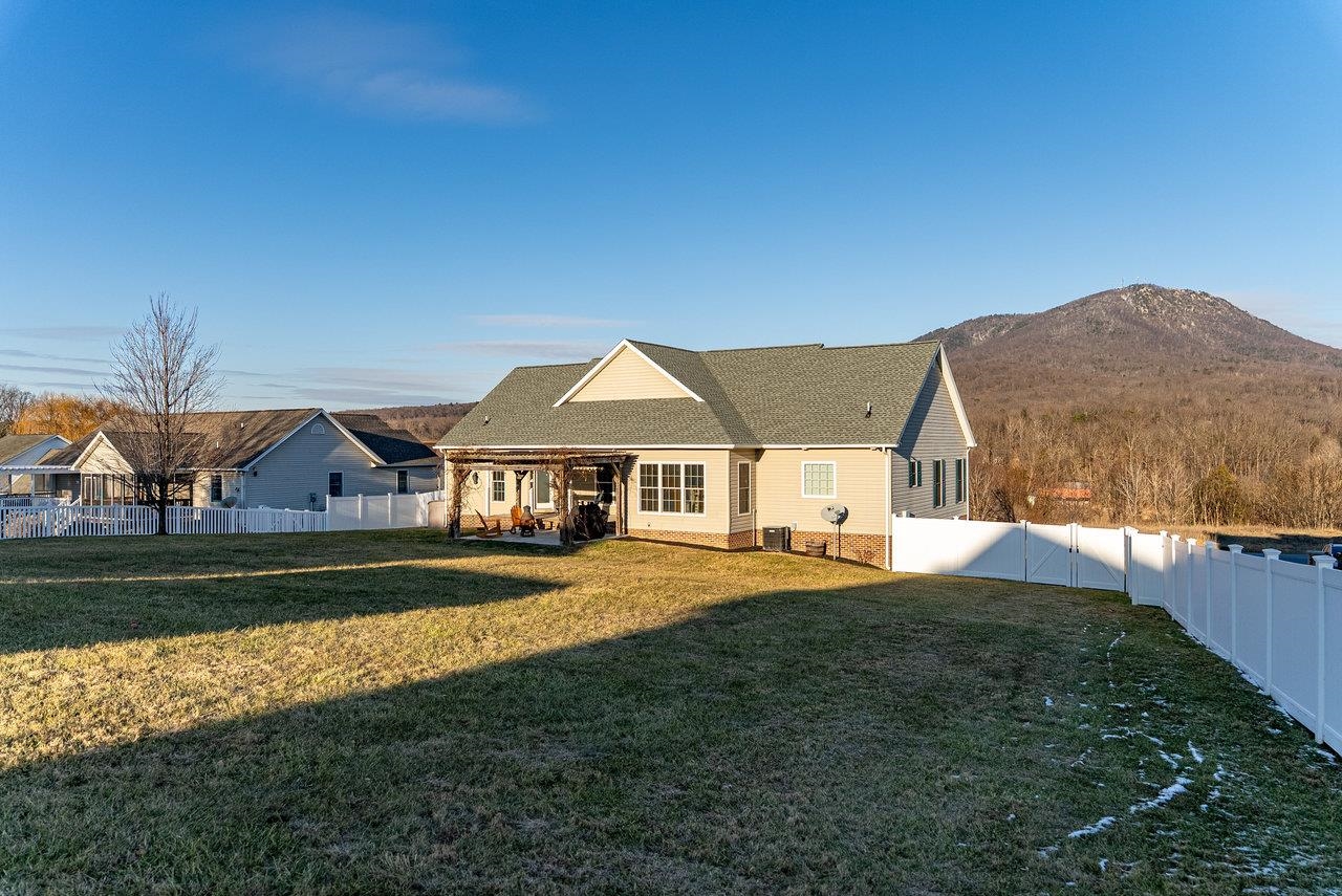 Features: Expansive, fully fenced backyard with a vinyl privacy fence and gate—plenty of room for kids and pets to play safely.