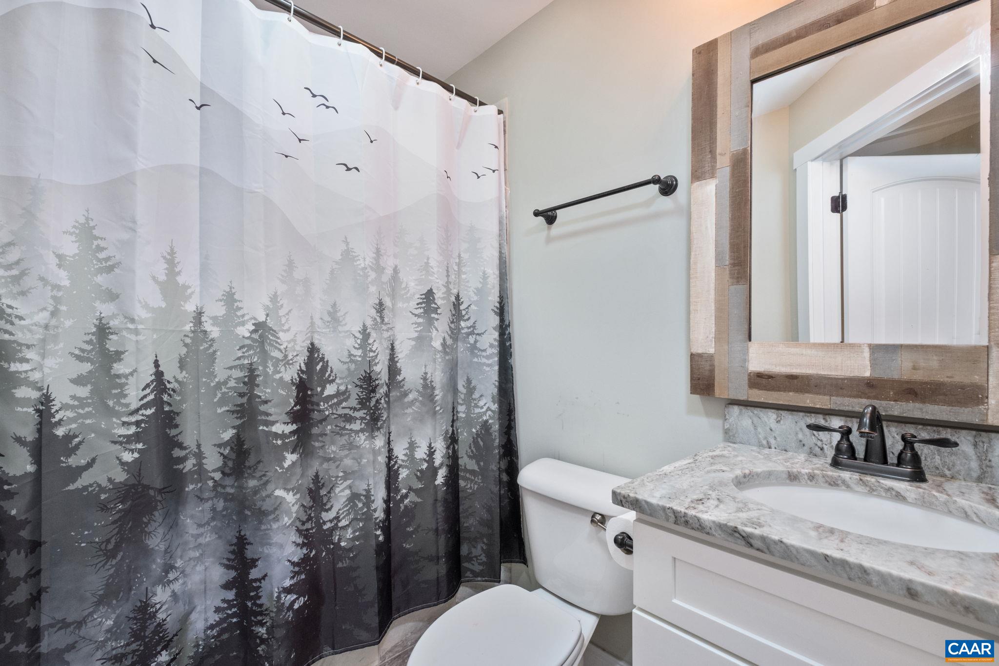 The full bathroom is located on the second level.