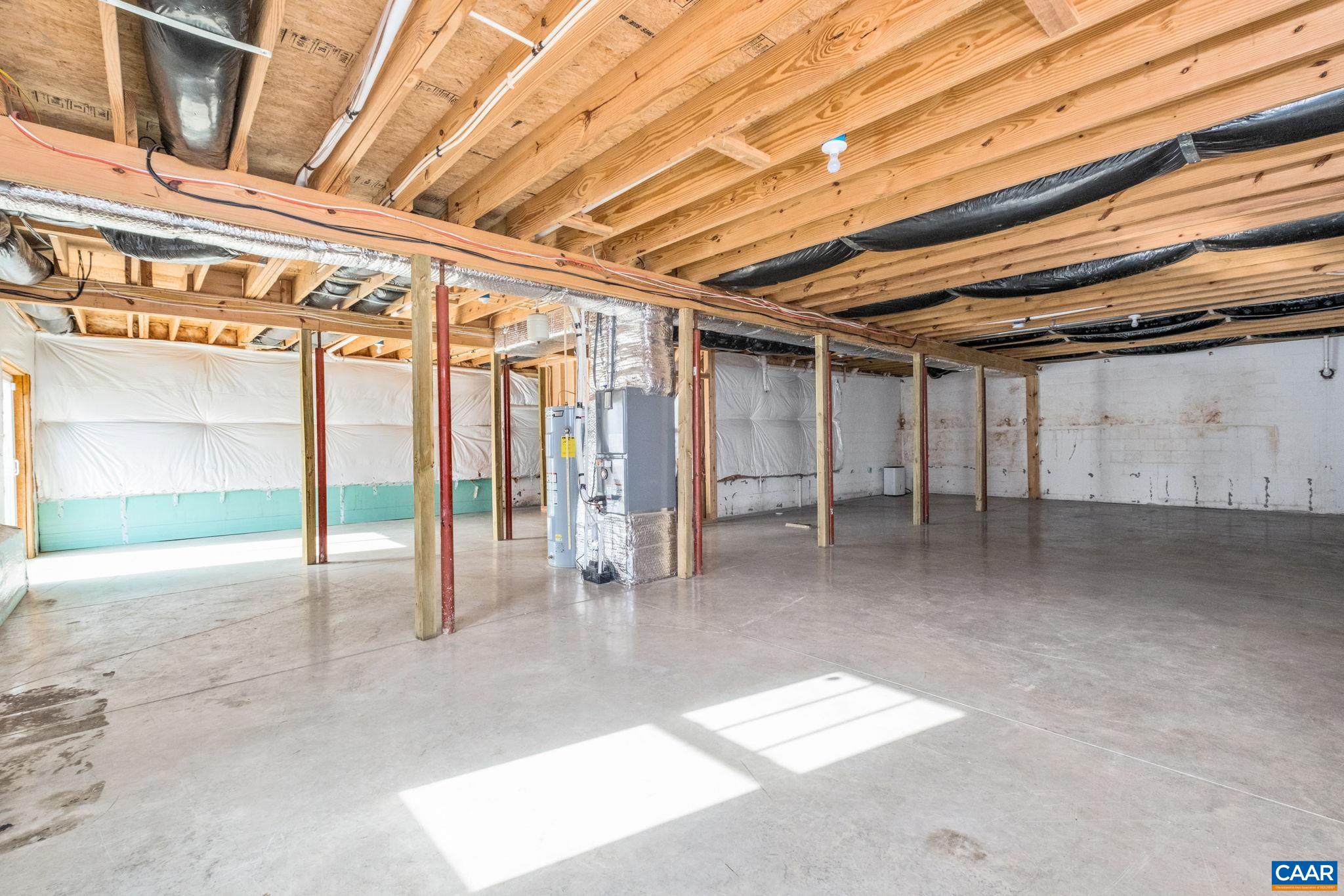 The basement has rough-in plumbing.  The basement features a Waterguard-DryTrack basement system and a sump pump.