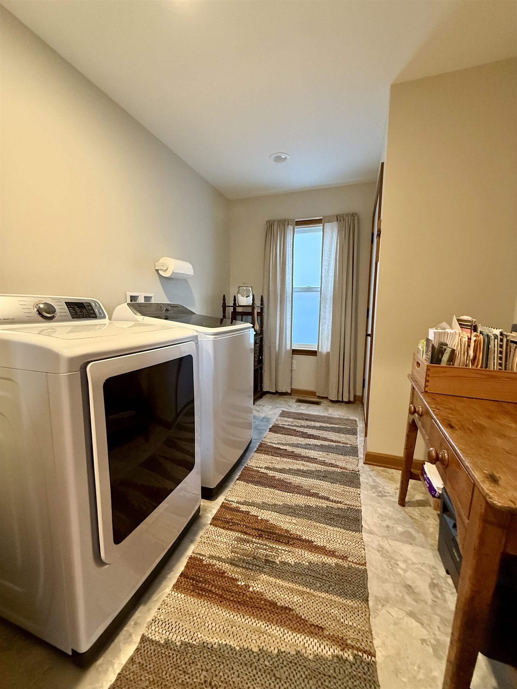 Closet with Pocket Doors and Entrance to Walkup Attic