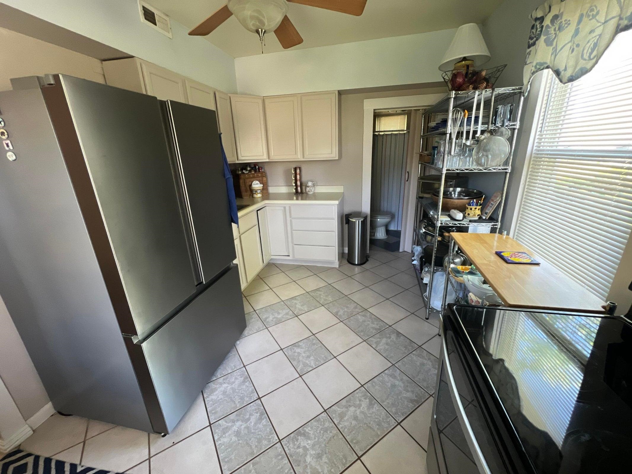Kitchen features a tiled floor. Kitchen features a tiled floor.