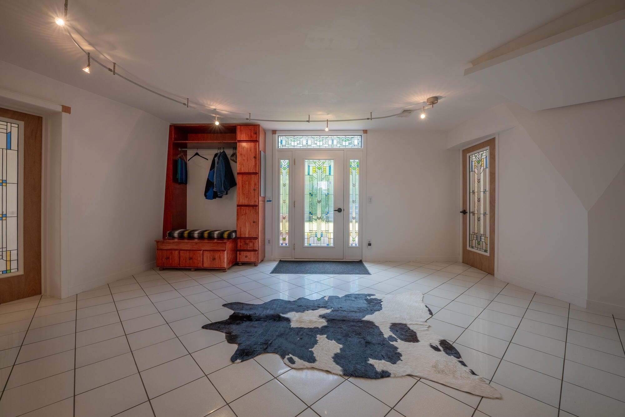 Main entrance joins the two Dome Buildings.