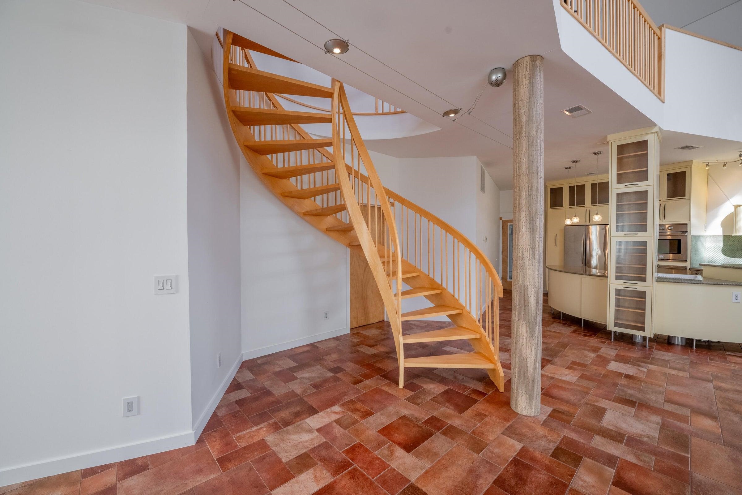 Artistic spiral staircase takes you to the 3nd floor.