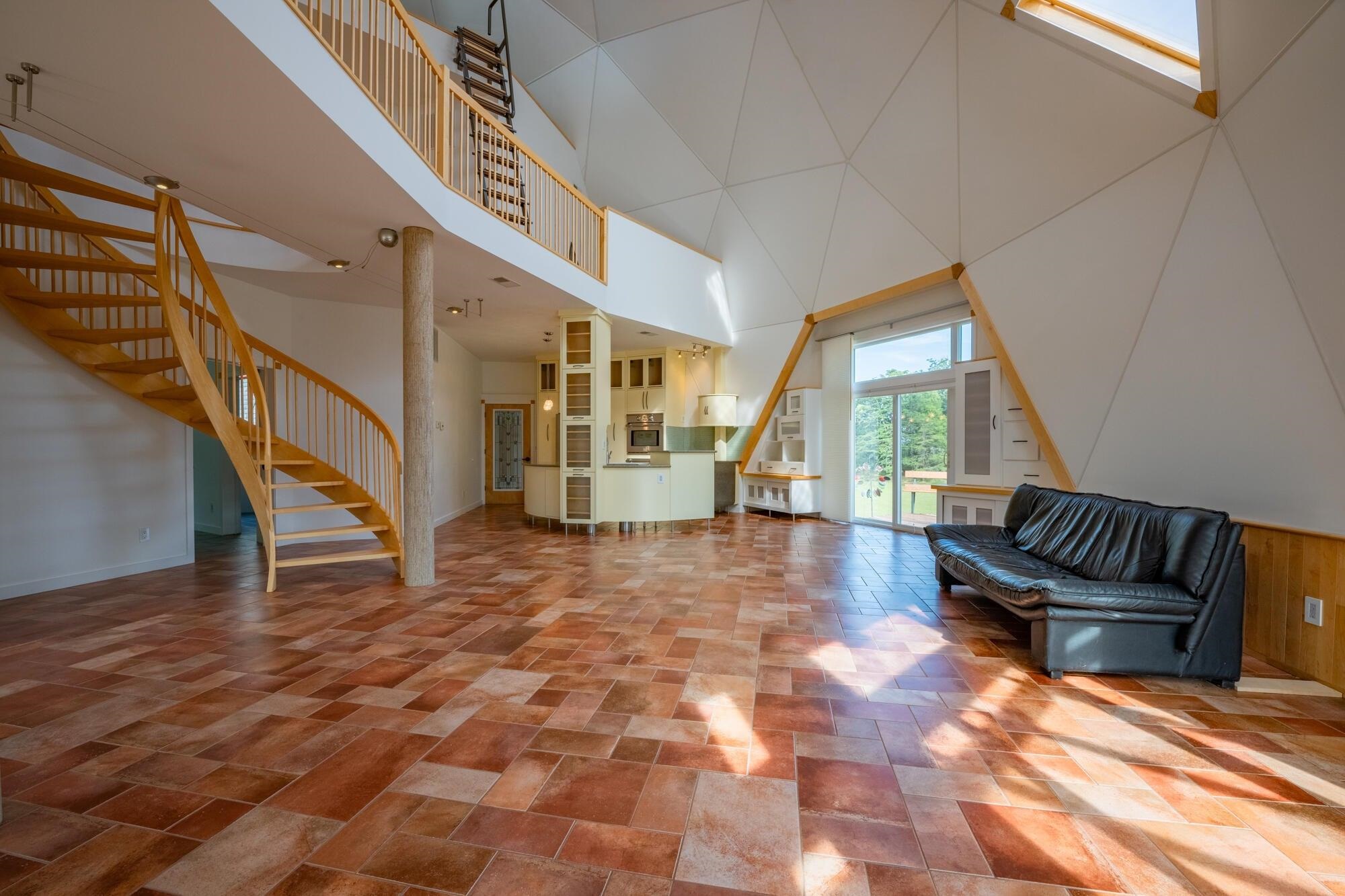 2nd floor balcony gazes down into the Great Room.