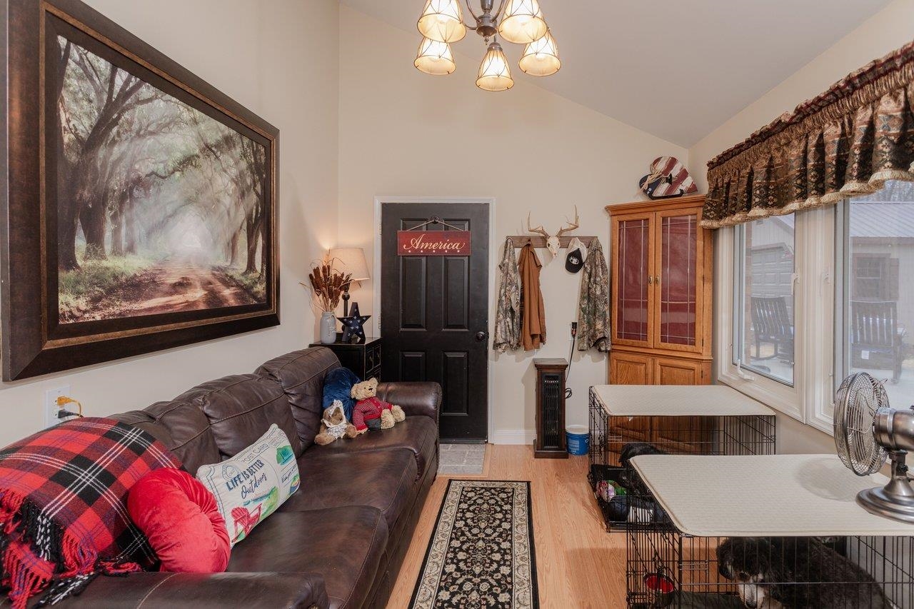 Family room has exterior, and door to garage.