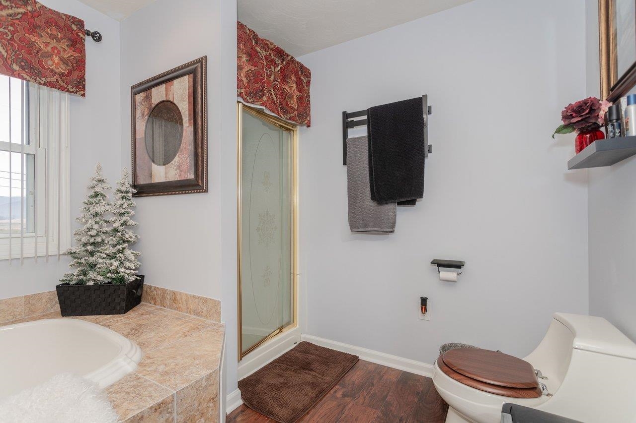 Separate shower with heated towel bar