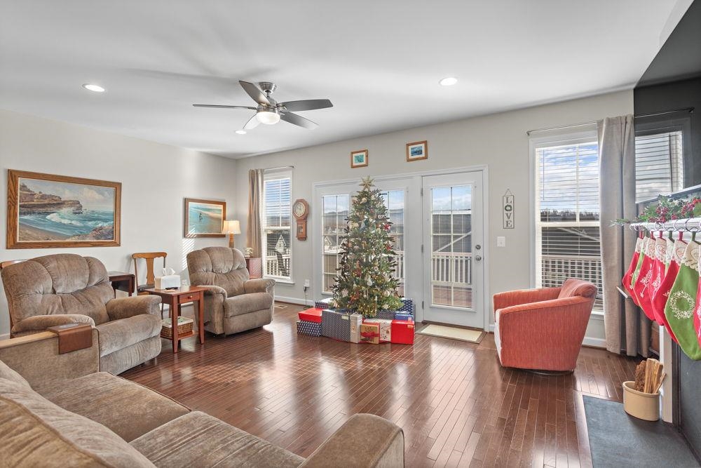 with access to rear deck! Lots of natural light and views.