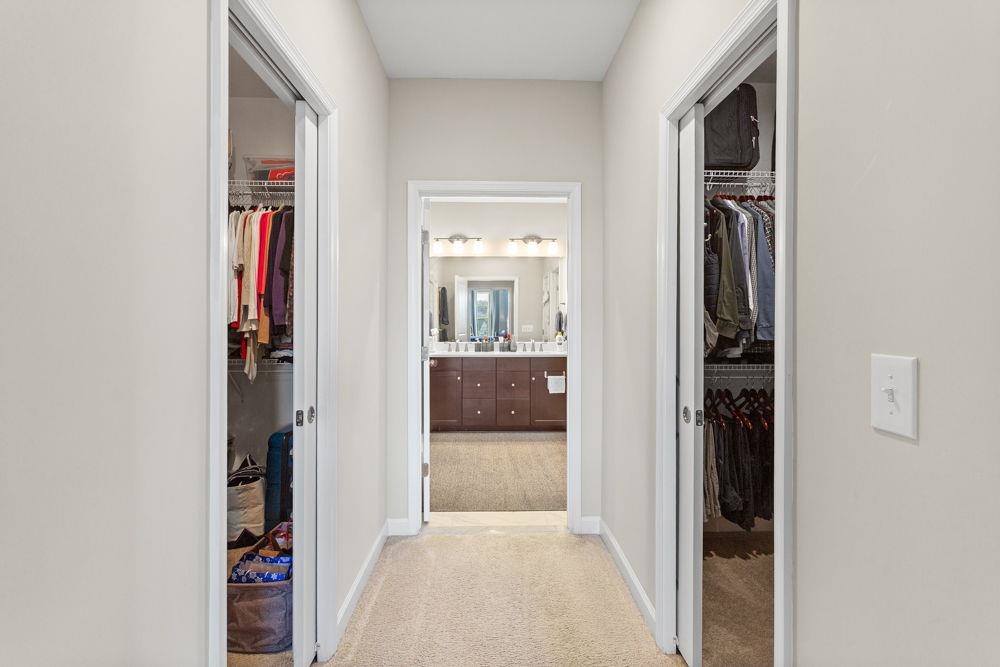 Entrance to owner's bath with 2 owner's closets.