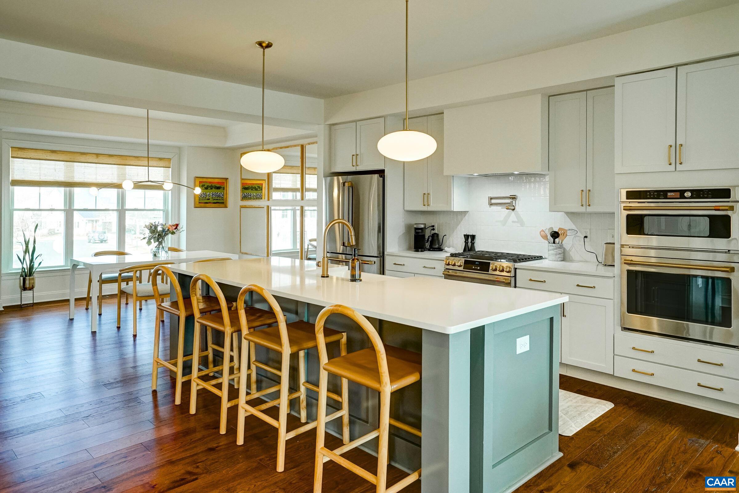 Expansive island with seating for four at the breakfast bar.