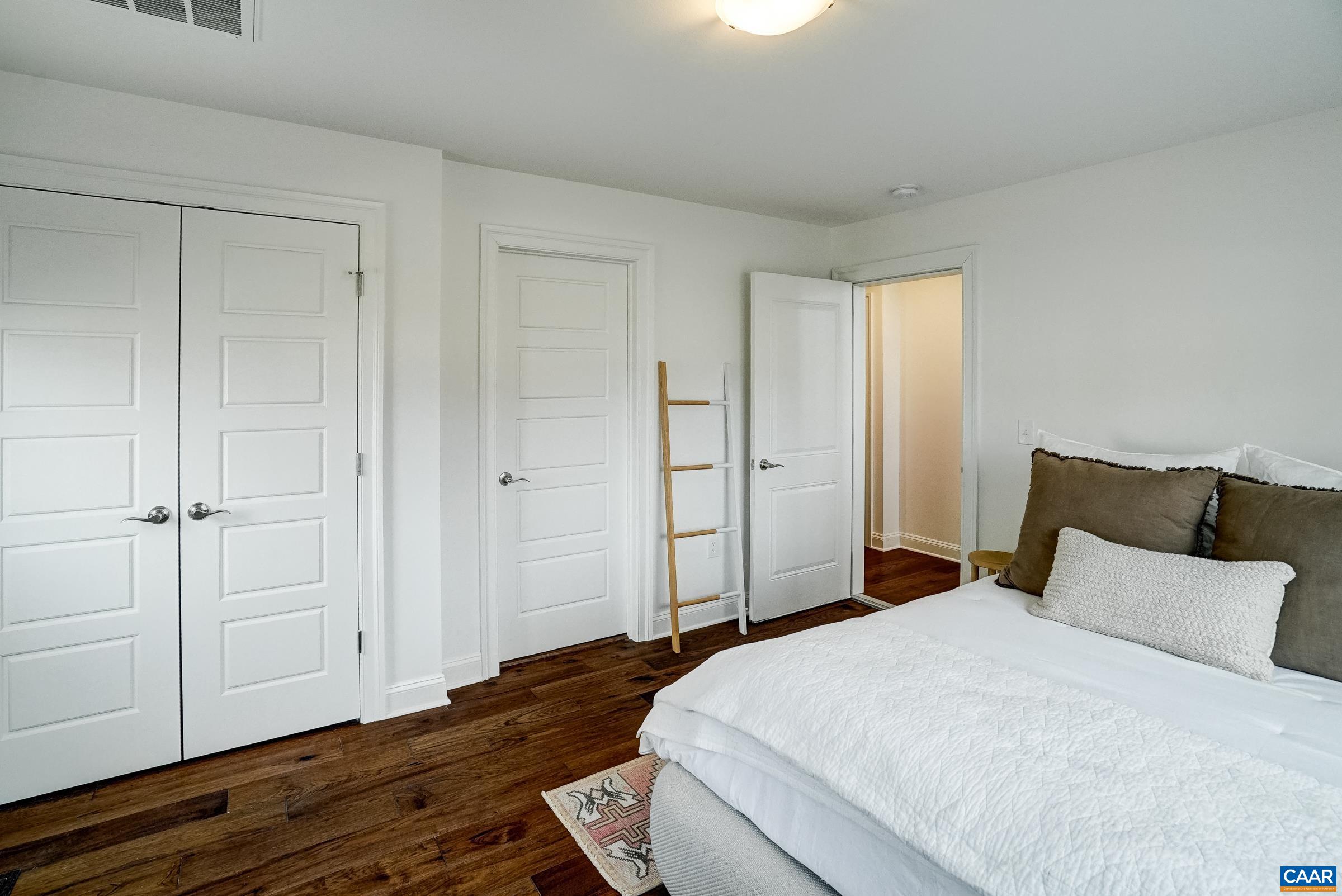 Kitchenette and walk in bathroom in ground floor bedroom.