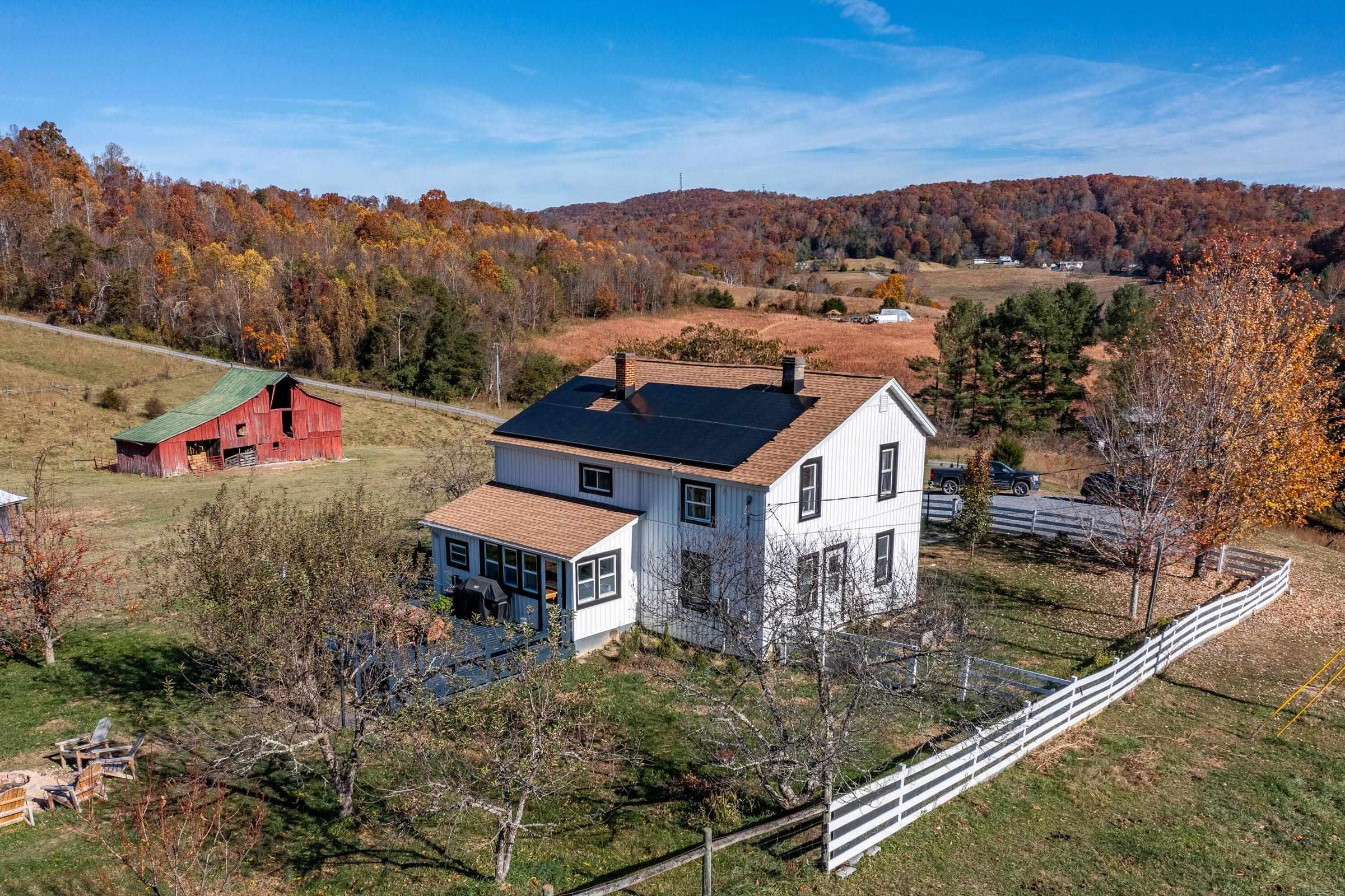 The established orchard offers apples, pears, peaches, and plums— a backyard full of bounty!