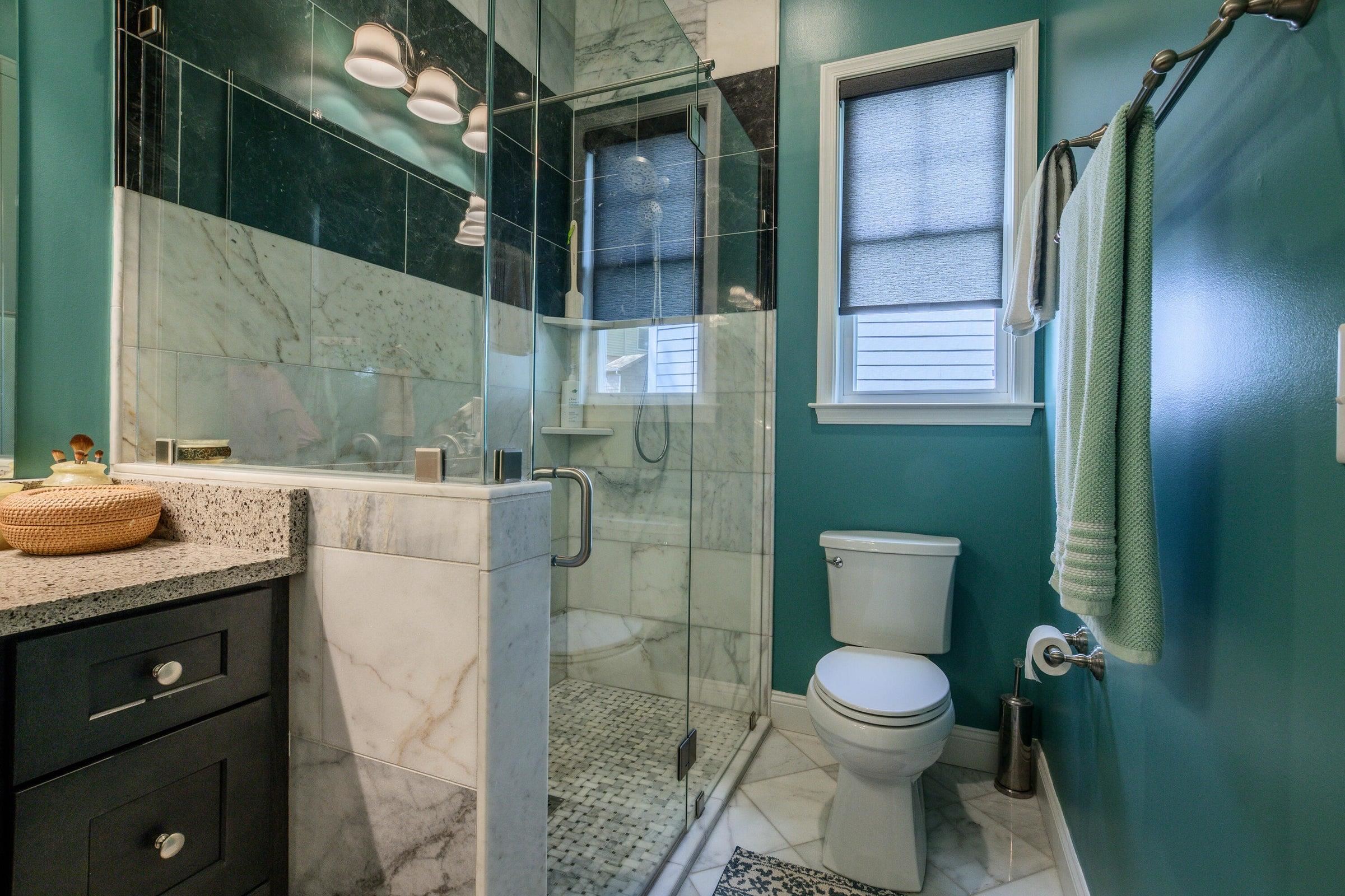 Natural marble on floors and in shower. Natural marble on floors and in shower.