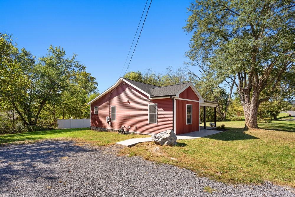 East side view with parking area.