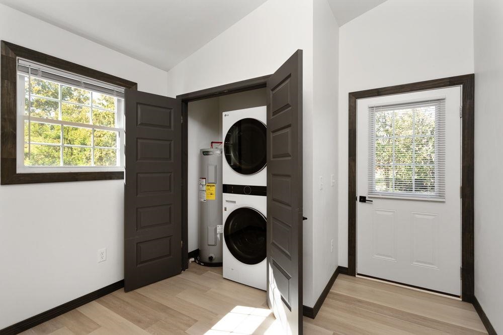 Stackable washer/dryer in the rear of the home!