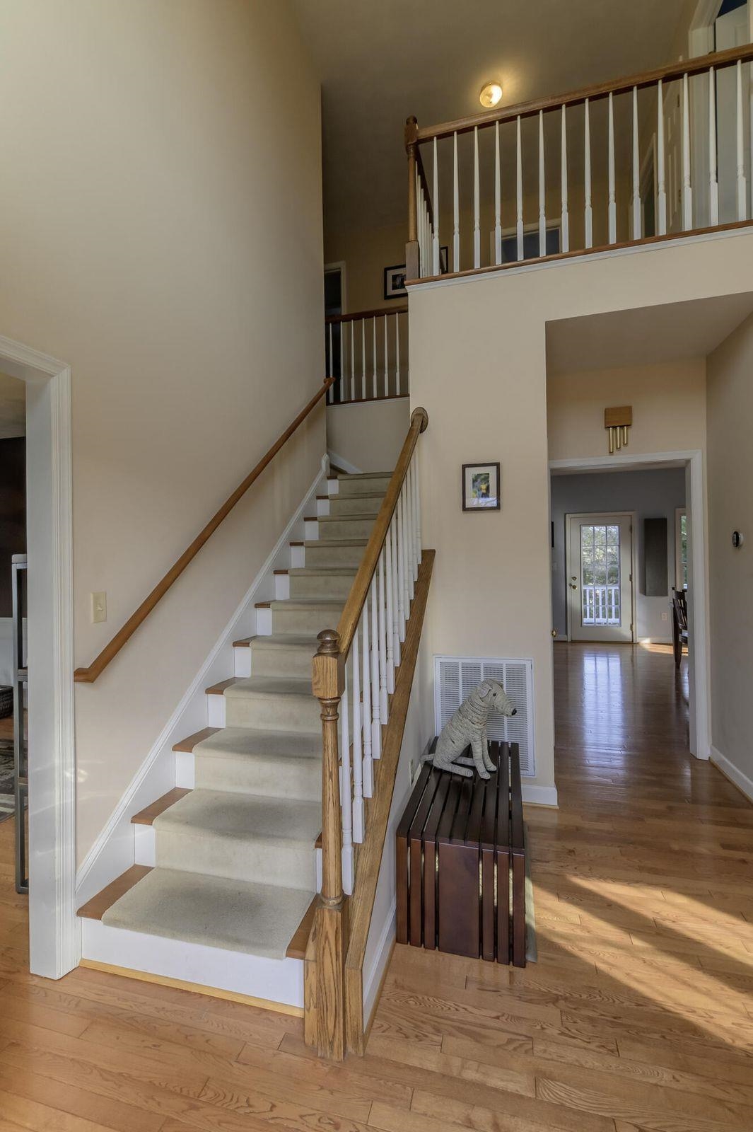 Elegant entrance way and stairs to the second floor. Elegant entrance way and stairs to the second floor.