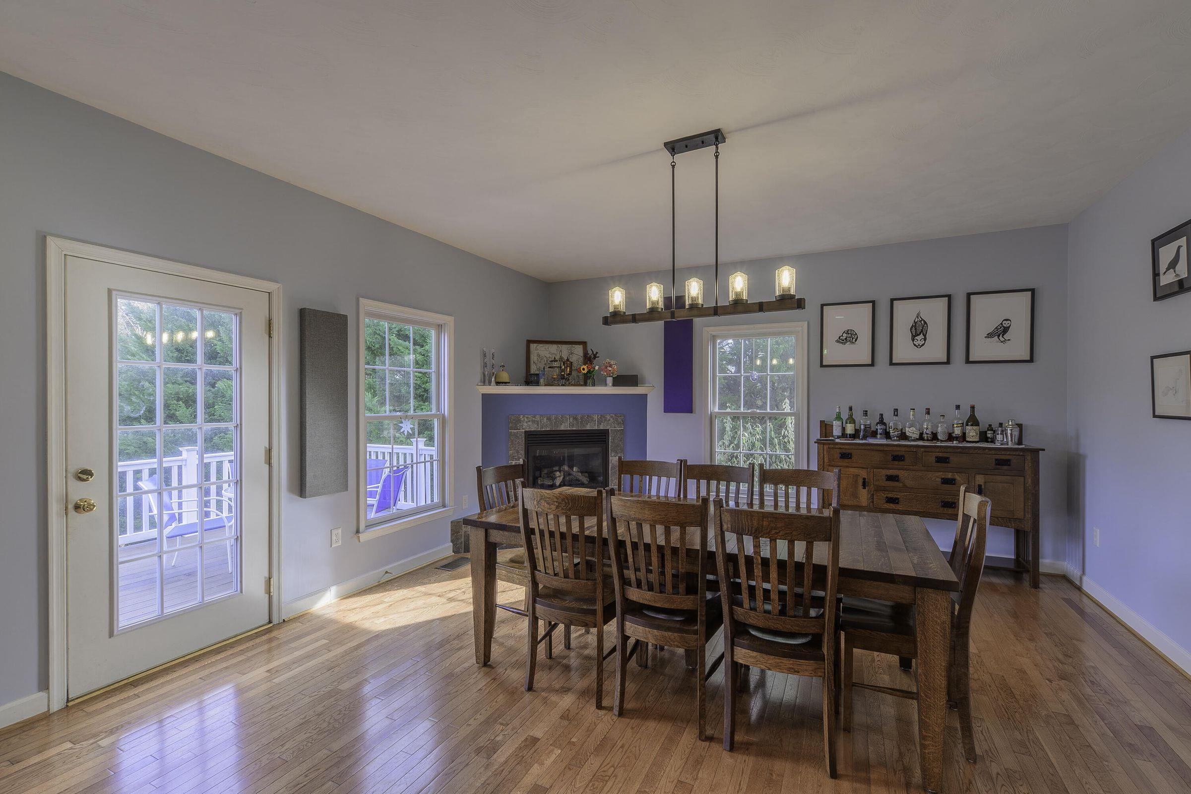 Dining area with attractive chandelier. Doors lead out to the balcony. Dining area with attractive chandelier. Doors lead out to the balcony.